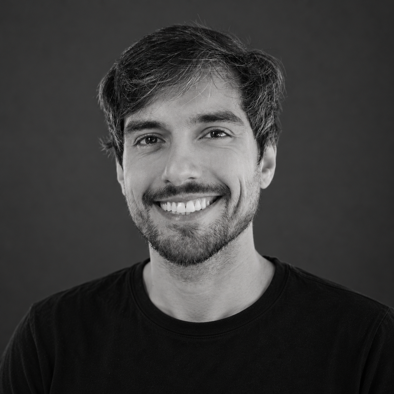 Black-and-white portrait of Tomer Friedman